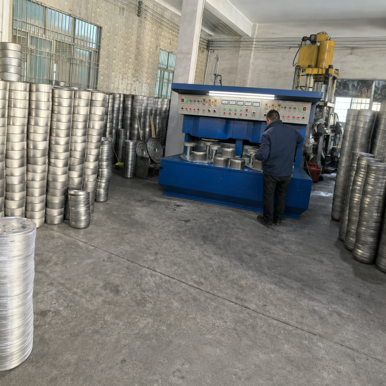 Composite bottom production for stainless steel cookware